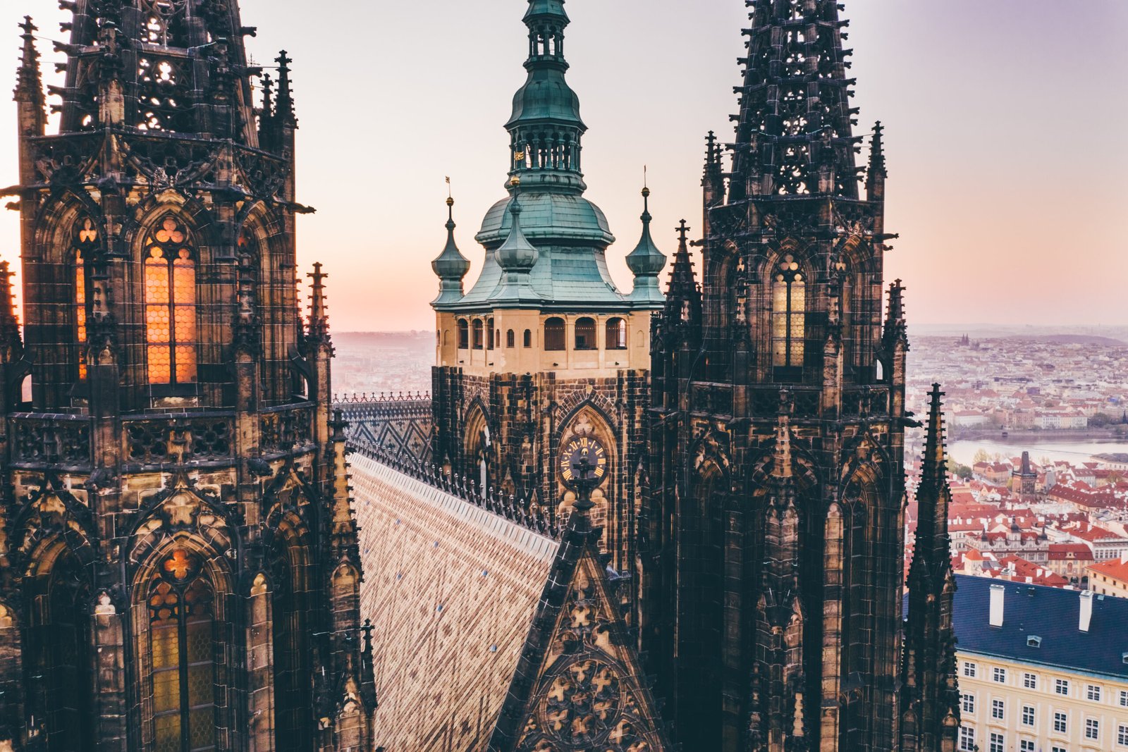 Gothic Towers of St. Vitus Cathedral Glowing at Sunset Above Prague