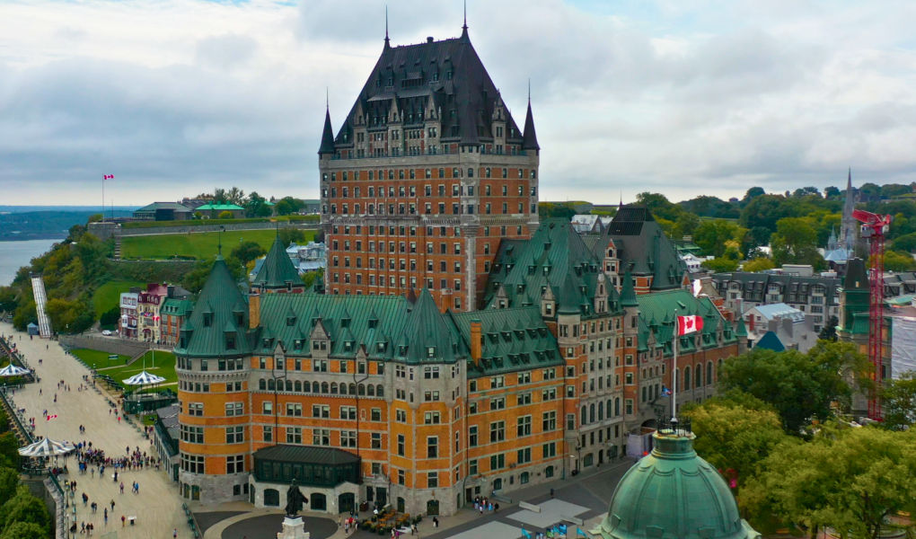 Fairmont Le Château Frontenac overlooking Old Quebec and the St. Lawrence River on a cloudy day