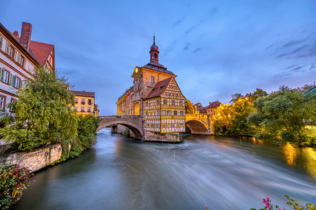 Bamberg’s historic Altes Rathaus perched over the Regnitz River at twilight