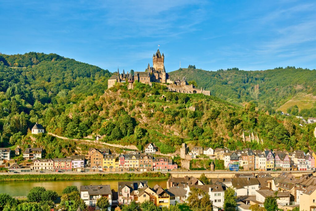 Cochem Castle overlooking the colorful town and Moselle River in Germany