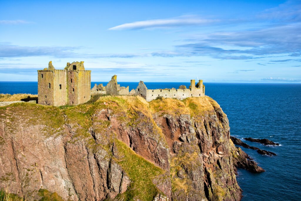 Ruins of Dunnottar Castle perched on a dramatic sea cliff overlooking the North Sea in Aberdeenshire, Scotland