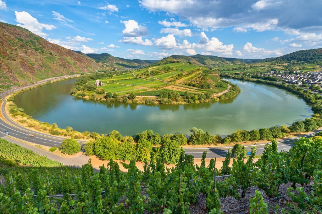 Scenic view of the Moselle River loop surrounded by vineyards and rolling hills in Germany