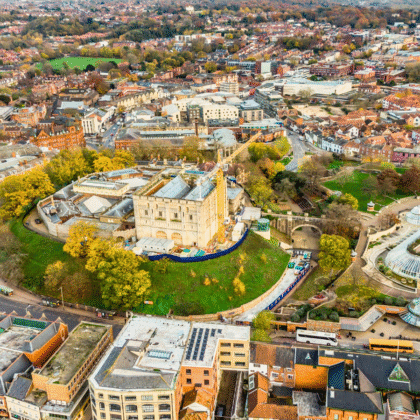 Aerial view of Norwich Castle surrounded by the cityscape of Norwich, England