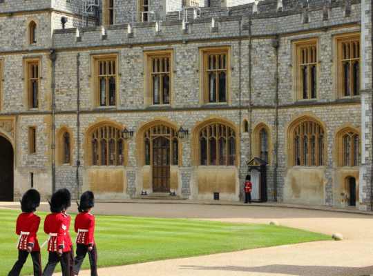 Windsor Castle guards in ceremonial uniform on duty in the Quadrangle