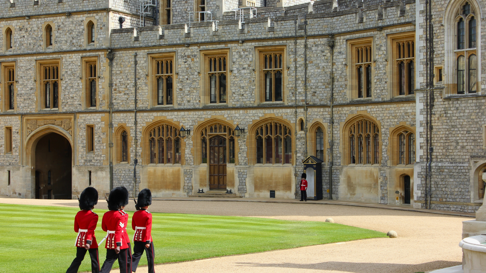 Windsor Castle guards in ceremonial uniform on duty in the Quadrangle