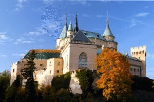 Bojnice Castle Slovakia with towers and autumn trees