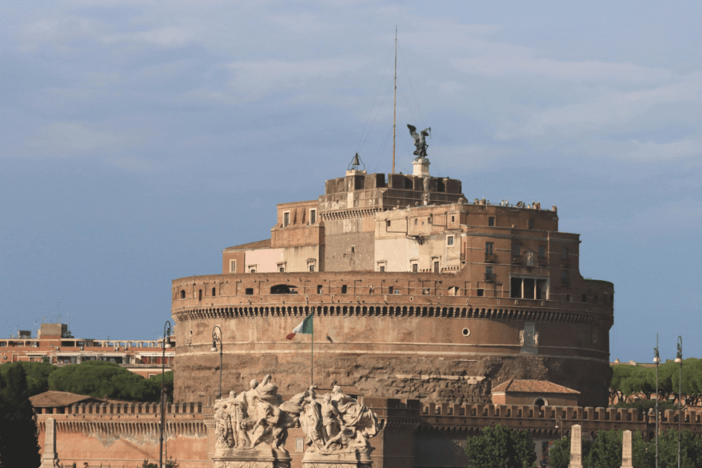 Castel Sant’Angelo in Rome with statue and surrounding cityscape