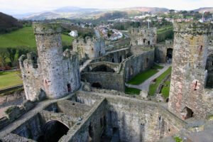Aerial view of Conwy Castle's towers and inner ward overlooking Conwy, North Wales.