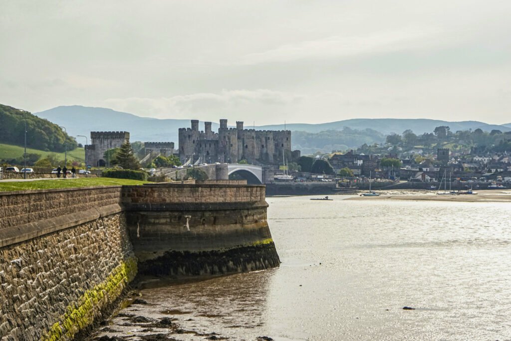 View of Conwy Castle and bridges across the estuary in North Wales.