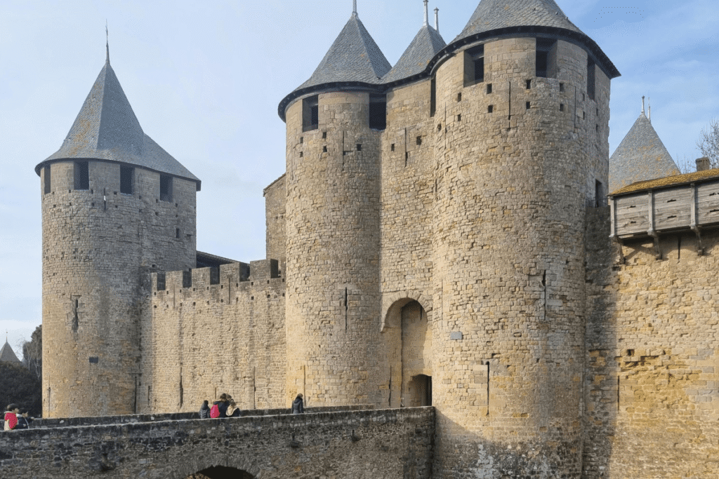 Carcassonne castle with stone towers and walls under blue sky