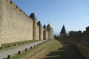 Carcassonne castle walls and towers under a clear sky.
