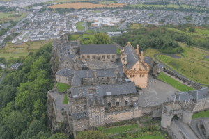 Aerial view of Stirling Castle overlooking Scottish town and landscape