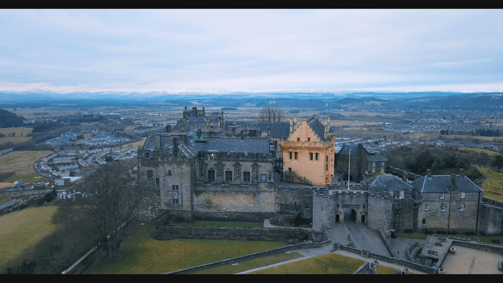 Aerial view of Stirling Castle with Scottish landscape surrounding the historic fortress.