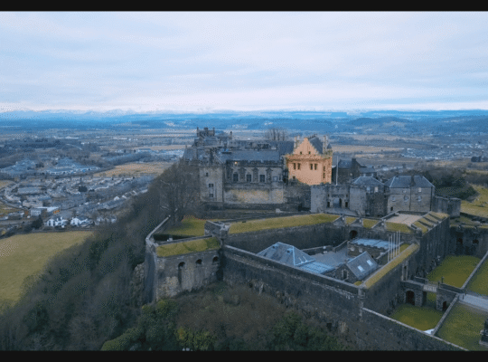 Aerial view of Stirling Castle dominating the Scottish Highlands landscape