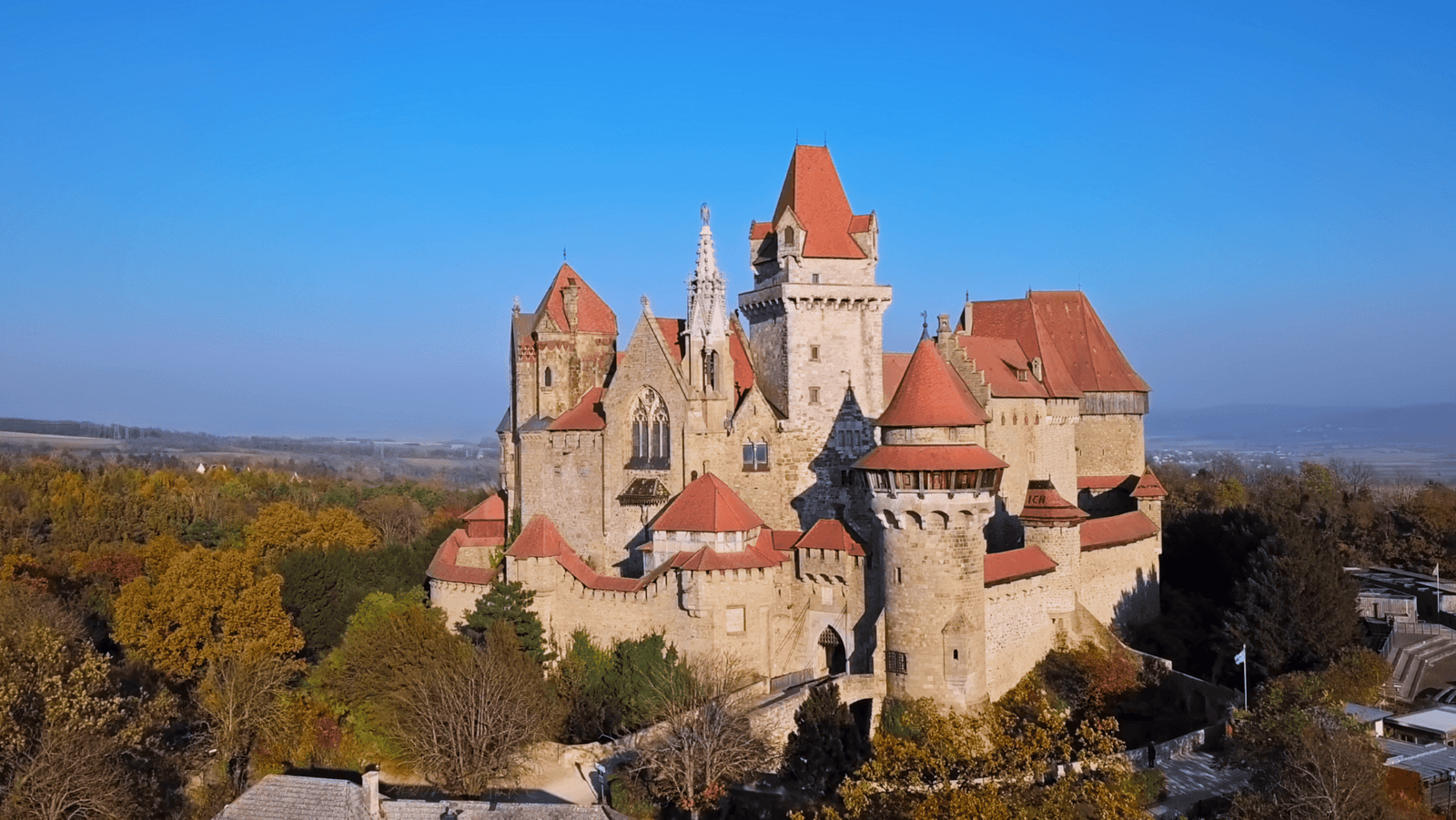 Kreuzenstein Castle above autumn forests near Vienna, Austria.