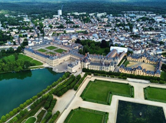 Aerial view of Château de Fontainebleau and its formal gardens