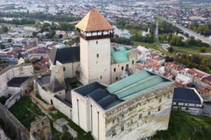 Aerial view of Trenčín Castle on hill above river and town