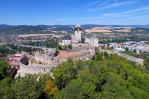 Aerial view of Trenčín Castle above town and valley