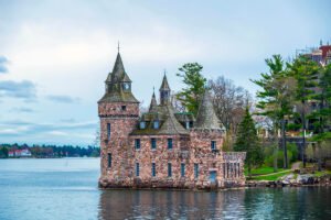 Boldt Castle stone turrets beside calm St. Lawrence waters