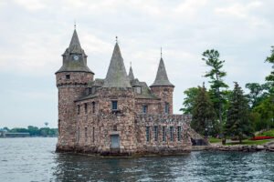 Boldt Castle towers on Heart Island shoreline beside St. Lawrence River