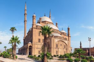 Exterior of Muhammad Ali Mosque at Cairo Citadel under blue sky
