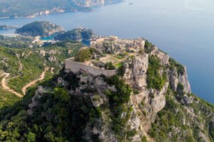 Aerial view of Castello bizantino di Angelokastro on rocky promontory