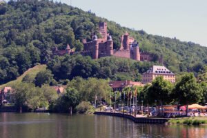 Castle Wertheim on wooded hill above the river promenade
