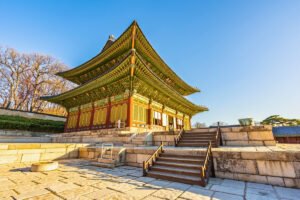 Changdeokgung Palace ornate pavilion and stone steps at sunrise