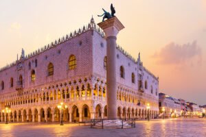 Doge's Palace exterior glowing at sunset in Venice