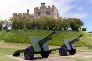 Dover Castle and green coastal artillery on grassy slope