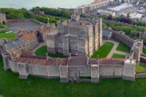 Aerial view of Dover Castle with surrounding walls and sea