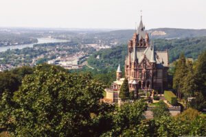 Drachenburg Castle on hilltop with Rhine valley view