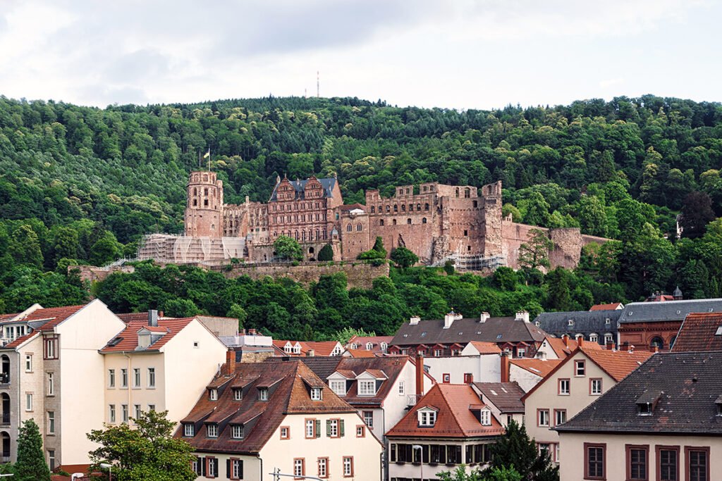 Heidelberg Castle on hill above red-roofed old town