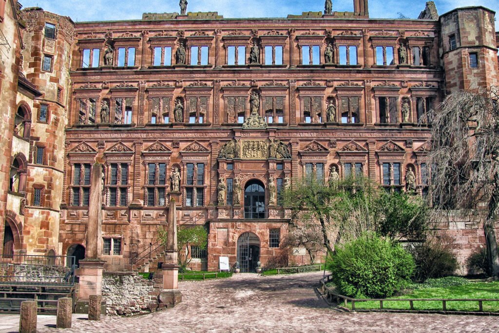 Heidelberg Castle red sandstone facade with statues and courtyard