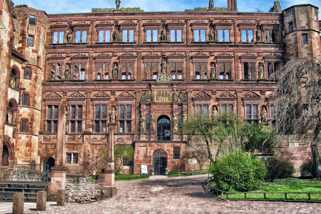 Heidelberg Castle red sandstone facade with statues and courtyard