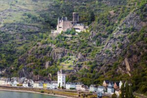 Katz Castle perched on rocky Rhine hillside above riverside village