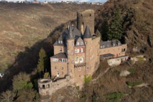 Katz Castle perched on steep Rhine cliff above valley