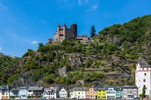 Katz Castle perched on rocky hill above colorful Rhine village