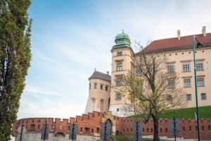 Wawel Castle exterior with brick wall and tower