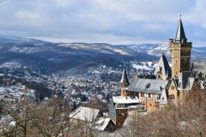 Wernigerode Castle overlooking snowy Harz town