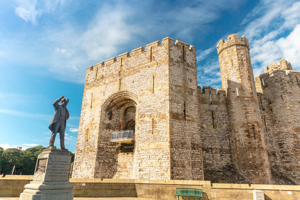 Caernarfon Castle stone entrance and statue
