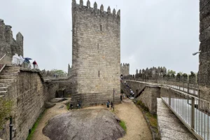 Castle of Guimaraes inner courtyard with tall keep and walkways