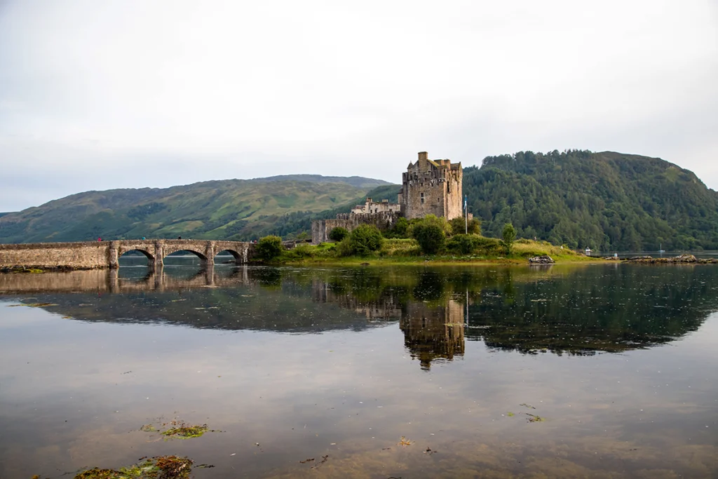 Eilean Donan Castle reflected in calm loch waters
