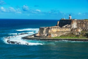 El Morro fortress on rugged cliffs beside blue Atlantic