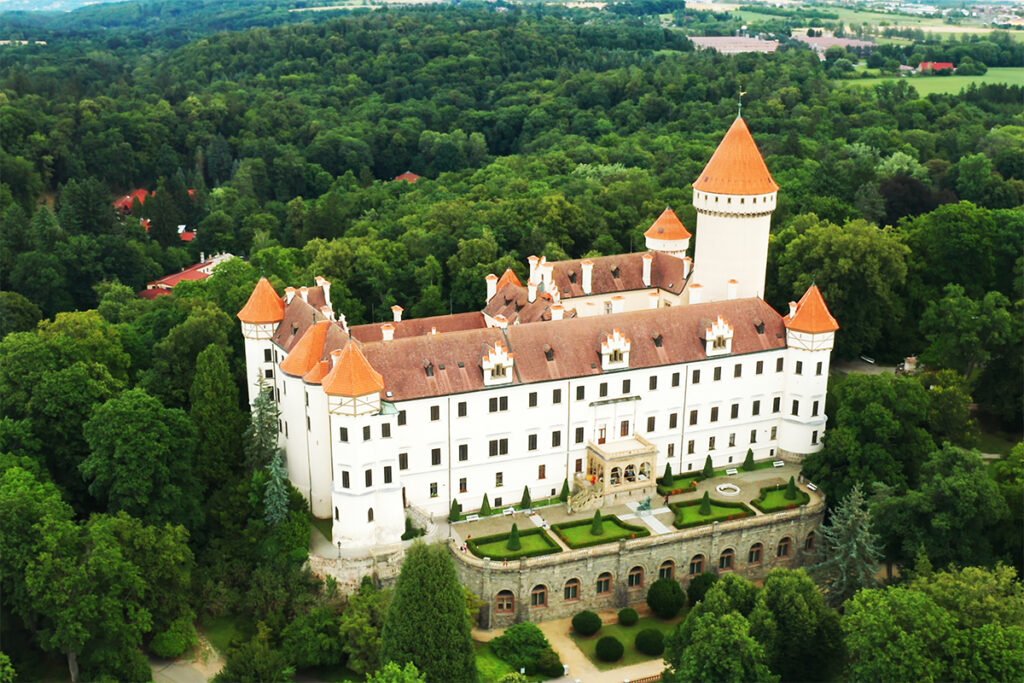 Aerial view of Konopiště Castle among green forest