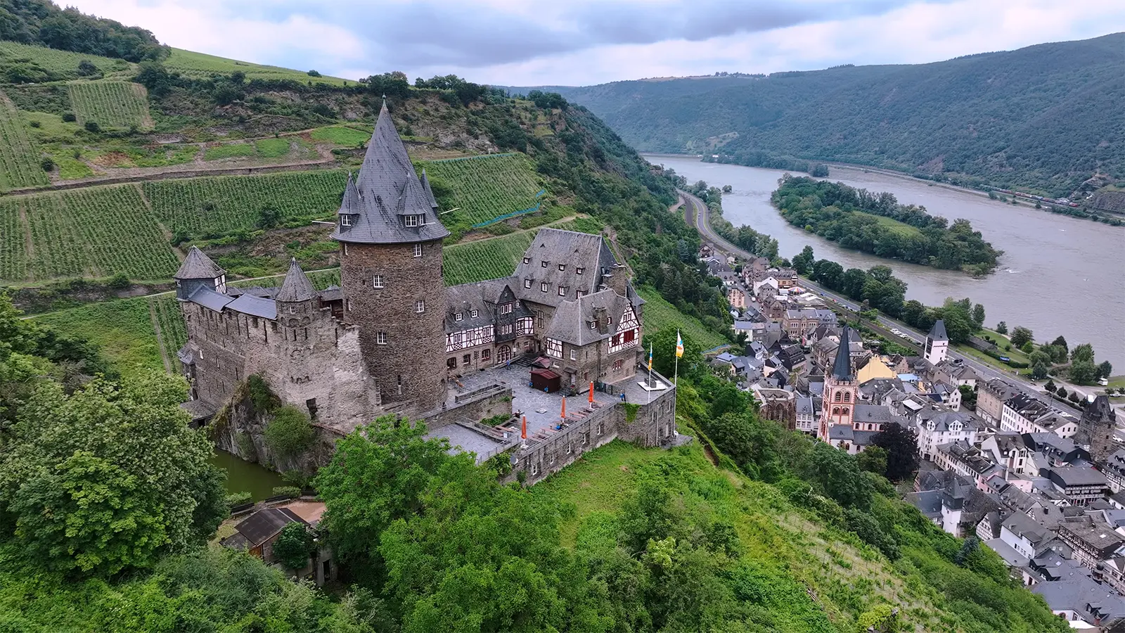 Stahleck Castle on hill above Rhine valley and village