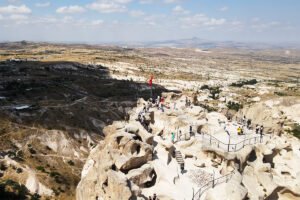 Aerial view of Uçhisar Castle summit and surrounding Cappadocia valleys