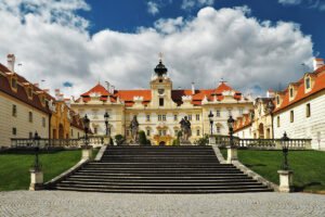 Front steps leading to Valtice Castle under dramatic clouds