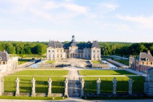 Château de Vaux-le-Vicomte viewed from gate, formal gardens and stately façade
