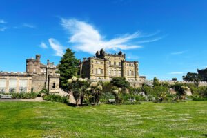 Culzean Castle framed by gardens and blue sky